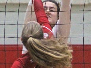Press photo/Andy Scheidler - Franklin senior Maitlyn Rewis blocks a shot during Monday’s semifinals match against Hendersonville. Rewis was one of three FHS players named to the all-tournament team. 