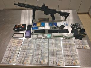 Photo submitted The suspect was driving on Sylva Road with $8,600 in cash, 109 grams of meth and an AR-15 rifle in his vehicle.