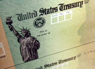 Press graphic - Federal stimulus relief checks are coming soon.