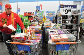 File photo - Randy Hughes, who heads up Smoky Mountain Toys for Tots, expects higher demand and less donations this year. 