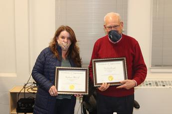 Press photo/Jake Browning - Stephanie MCall and Fred Goldsmith were presented with certificates of recognition of their work on the board.