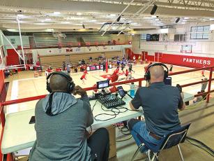 Press Photo/Will Woolever - Franklin Panther Sports Network color commentator Tony Christie (left) and play-by-play announcer George Young overlook Tom Raby Court while calling a recent JV volleyball match.