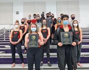 Press photo/Will Woolever - Members of the Franklin Swim and Dive Team show off two plaques certifying their Mountain Six Conference titles. The team will now prepare for the 2-A West Regional meet in Charlotte Feb. 5-6. 