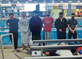 Press Photo/Will Woolever - Franklin Boys Swim Team members (from left) Kyler Cochran, Luke Borgmann, Michael Frazier, Caden Tyler, Clayton Guynn, and Hunter Cabe are pictured at the NCHSAA Championship Swim meet Feb. 12. Franklin tied for 20th out of 28 teams statewide.