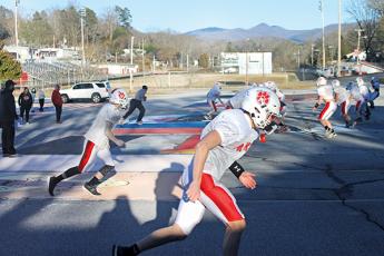Press photo/Will Woolever – Junior tight end Austin Pittman and senior wide receiver Seth Crupi get off the line in a drill during a recent Panther practice. The Panthers defeated Hayesville 28-7 March 1 to begin the season.