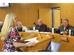 Press photo/Jake Browning County Finance Director Lori Carpenter addresses the Board of Commissioners as they begin the 2022-2023 budget process.