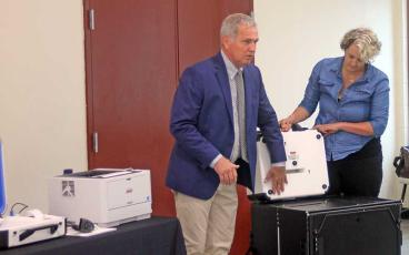 Press photo/Will Woolever - The Macon County Board of Elections held a demonstration of the Hart InterCivic Verity voting system on Aug. 30. The Board of Elections is recommending that the county buy the system to replace the current voting equipment that has been used since 2005.