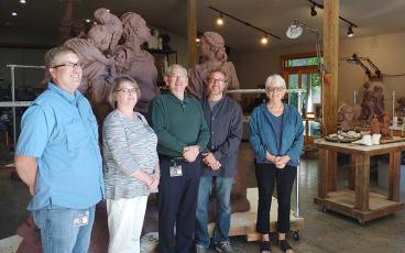 Photo submitted - Town of Franklin representatives recently visited Wesley Wofford’s studio to see the “Sowing the Seeds of the Future” sculpture. Pictured: Town Planner Justin Setser, Town Manager Amie Owens, Mayor Jack Horton, Wofford and Council Member Rita Salain.