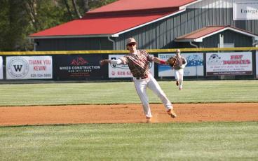Press file photo - Junior shortstop Ian Knepp throws to first versus A.C. Reynolds April 19 at McConnell Field.
