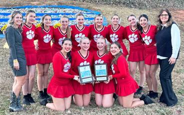 Photo courtesy of Lynn Baker - Panther cheer and dance are pictured with their second-place plaques at the Universal Cheerleaders’ Association Regional in Concord Nov. 4.