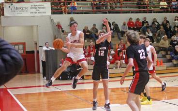 Press photo/Will Woolever - Junior guard Max McClure looks for an outlet pass against Rabun County, Georgia Dec. 5.