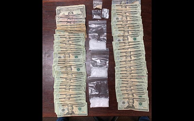 Photo submitted - Officers seized $1,700 in cash, 90 grams of methamphetamine and six grams of heroin.