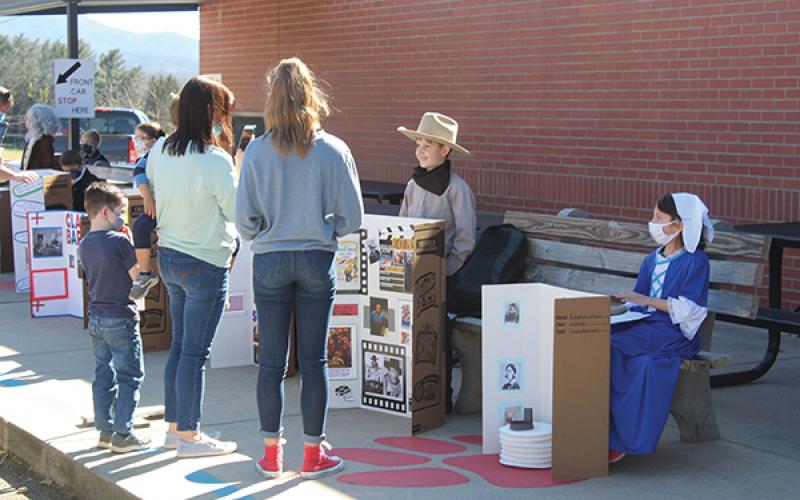 Press photo/Jake Browning - Students at East Franklin Elementary School participate in the school’s wax museum in February. This year’s wax museum had to be held outside and students were stationed six feet apart from each other, both measures to comply with COVID-19 prevention plans.
