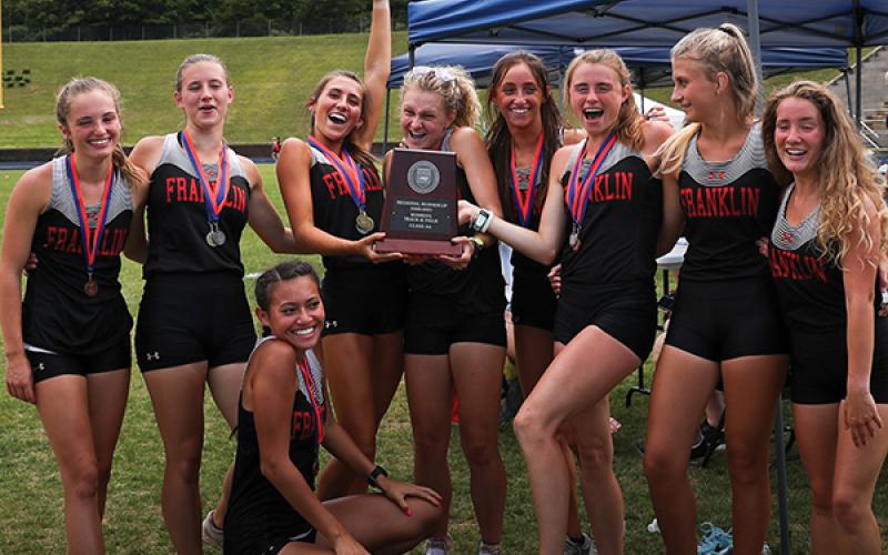 Photo courtesy of FHS track and field - Members of the FHS women’s track and field team show off their hardware after taking 2nd place at the 2A West Regional meet June 18.