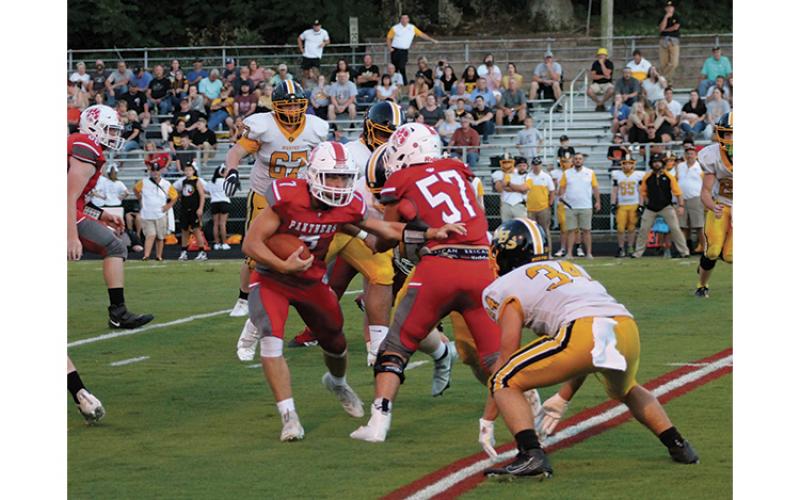 Press Photo/Will Woolever - Senior running back/safety Kellen Stiles meets a Murphy linebacker in the hole in Franklin’s 35-15 win at the Panther Pit Aug. 20.