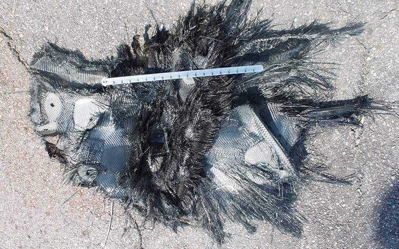 Press photo/Thomas Sherrill - Jeff McDougall found space debris at his home in the Holly Springs community. It is believed to be from the SpaceX Dragon Crew-7. For reference, an 18-inch ruler is shown on a piece of the debris.
